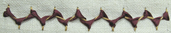Silk ribbon woven through Cretan Stitch 