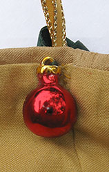 Red Bauble button to hide stitching